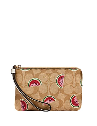 Medium - sized Coach shoulder bags in rich, deep colors for a sophisticated appearanceCoach Corner Zip Wristlet in Signature With Watermelon Print