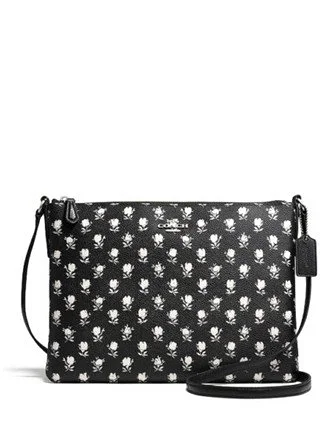 Coach Borough bags with a structured silhouette and a magnetic - snap closureCoach Americana Crossbody in Floral Print Coated Canvas