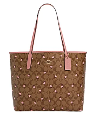 Ladies Coach crossbody bags with a wide - width strap for comfortCoach City Tote in Signature Canvas With Heart Floral Print