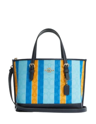 Coach tote bags with a snap - button closure and a decorative charm for styleCoach Mollie Tote 25 In Signature Jacquard With Stripes