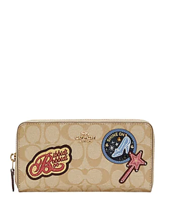 Coach crossbody bags with a printed floral pattern for a feminine touchCoach Disney X Accordion Zip Wallet In Signature Canvas With Patches