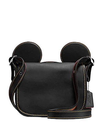 Ladies Coach Rogue bags with a star - shaped charm for a playful touchCoach Patricia Saddle in Glove Calf Leather With Mickey Ears