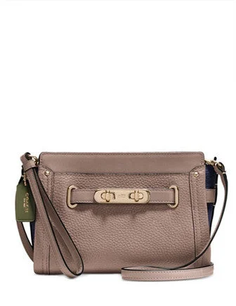 Ladies Coach Borough bags in a pastel shade for a soft and delicate appearanceCoach Swagger Wristlet in Colorblock Pebble Leather