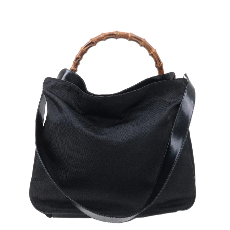 Women Gucci Sylvie bags with a leather - wrapped handleWomen Gucci Sylvie bags with a leather - wrapped handleGUCCI Bamboo Nylon Patent Leather 2Way Shoulder Bag Black 001.1998