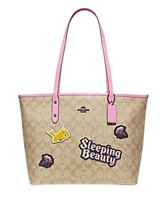 Ladies Coach Borough bags in a pastel shade for a soft and delicate appearanceCoach Disney X City Zip Tote In Signature Canvas With Sleeping Beauty