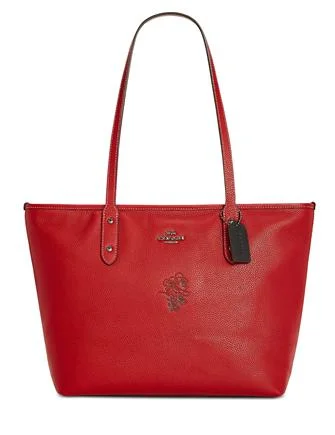 Ladies Coach Tabby bags with a detachable shoulder strapCoach Minnie Motif City Tote in Pebble Leather