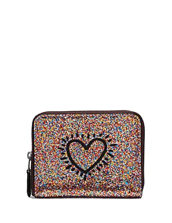 Coach Borough bags with a removable interior organizerCoach Keith Haring Small Zip Around Wallet