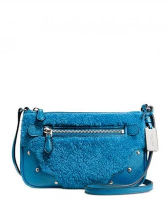 Ladies Coach Rogue bags with a star - shaped charm for a playful touchCoach Small Rhyder Pochette in Shearling