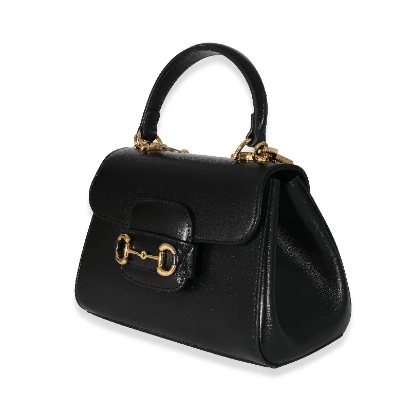 Ladies Gucci handbags with a detachable coin purse insideLadies Gucci handbags with a detachable coin purse insideGucci Black Leather Horsebit 1955 Mini Bag