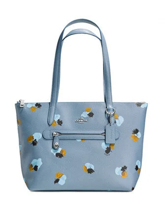 Coach tote bags with a double - handle and shoulder - strap option for easy useCoach Taylor Tote in Floral Print Coated Canvas