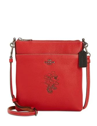 Coach tote bags with a printed Coach logo for brand visibilityCoach Minnie Motif Messenger Crossbody in Pebble Leather