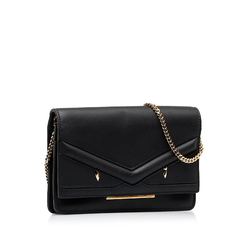 Ladies Fendi Peekaboo bags with gold - toned hardware for a touch of luxuryFENDI Monster Wallet on Chain Crossbody Bag