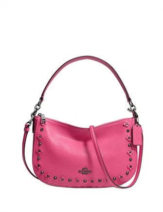 Coach Dempsey bags with a crystal - embellished C - logo for added luxuryCoach Chelsea Crossbody in Floral Rivets Leather