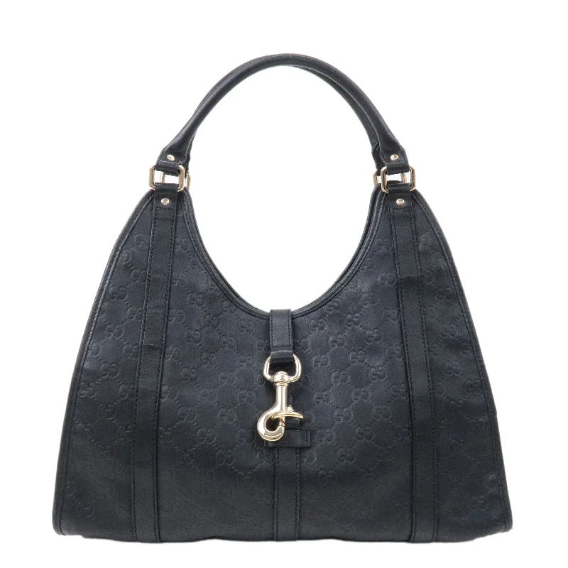 Women Gucci bags with a chain - link trim and a leather bodyWomen Gucci bags with a chain - link trim and a leather bodyGUCCI Guccissima Leather Logo Shoulder Bag Black 203494