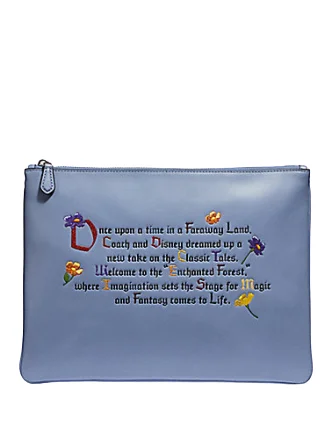 Coach bags with a chain - link trim and a leather body for a modern edgeCoach Disney X Large Clutch 30 With Once Upon A Time Print