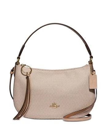 Coach bags with a zippered interior pocket for separating itemsCoach Legacy Jacquard Sutton Crossbody