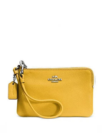 Coach Dempsey bags with a leather - wrapped drawstring for a luxurious feelCoach Embossed Small L-Zip Wristlet in Leather