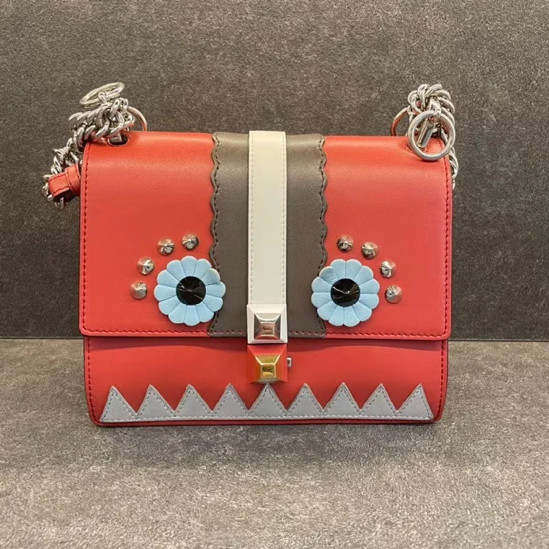 Ladies Fendi Peekaboo bags with a hand - carved leather detail for a unique and artisanal touchFendi Mini Monster Bag Red Multicolor Leather Crossbody