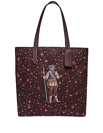 Coach Rogue bags with a detachable shoulder strap for versatile carryingCoach Star Wars X Tote With Starry Print and Princess Leia as Boushh