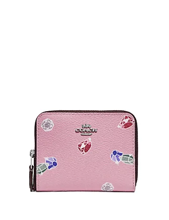 Ladies Coach Tabby bags with a textured leather surface for a more tactile lookCoach Disney X Small Zip Around Wallet Snow White Gems Print