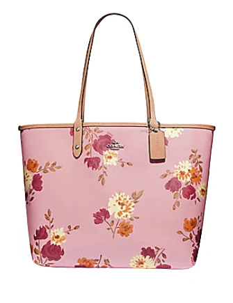 Coach bags with a front - zip pocket for small items like keys and cardsCoach Reversible City Tote in Signature Canvas With Peony Print