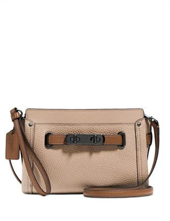 Coach Borough bags with a removable interior organizerCoach Swagger Wristlet in Colorblock Pebble Leather