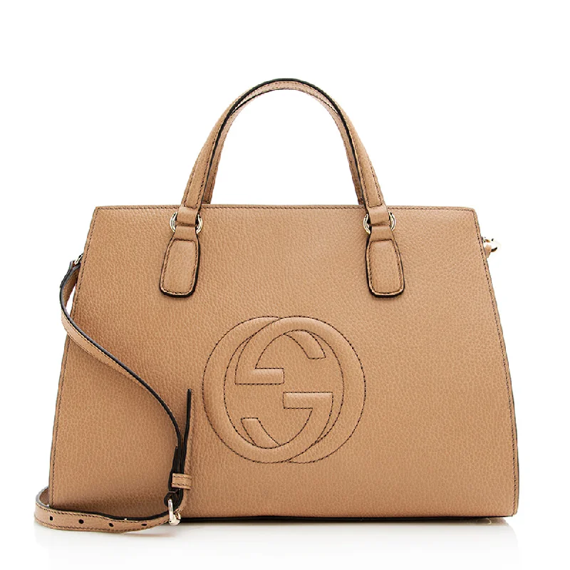 Women Gucci bags with a snap - button closure and a decorative charmWomen Gucci bags with a snap - button closure and a decorative charmGucci Leather Soho Medium Top Handle Satchel