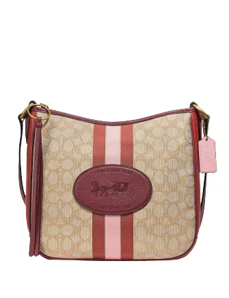 Ladies Coach Borough bags in a pastel shade for a soft and delicate appearanceCoach Chaise Signature Jacquard Crossbody