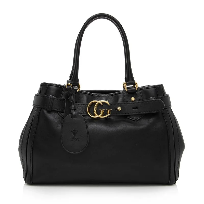 Women Gucci Sylvie bags with a monogram - embossed leatherWomen Gucci Sylvie bags with a monogram - embossed leatherGucci Leather GG Running Medium Tote (SHF-14457)