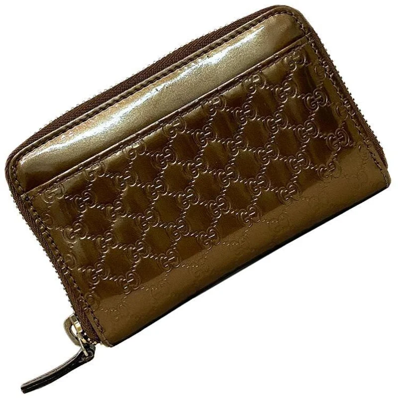 Gucci Marmont bags for women with a snakeskin - effect panelGucci Marmont bags for women with a snakeskin - effect panelGucci Coin Case Bronze Gold Micro Shima 256810 Patent Leather Gucci Brown Purse Card Pocket GG Round