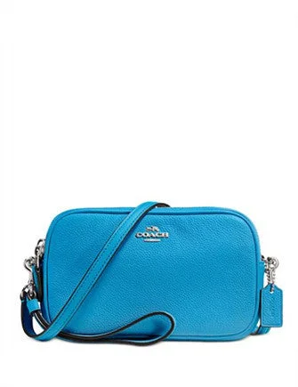 Coach Borough bags with a contrast - stitched handle for a unique lookCoach Crossbody Clutch in Pebble Leather