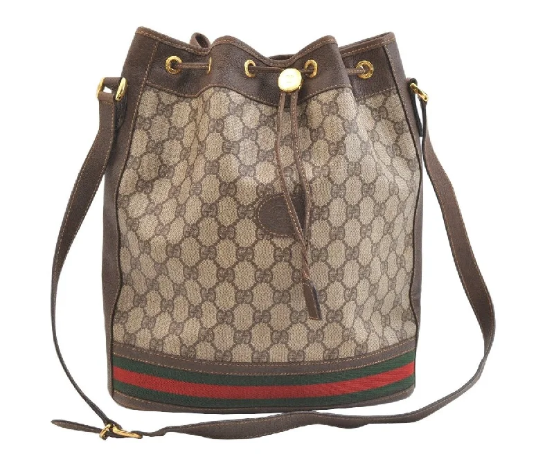 Women Gucci bags with a detachable mirror insideWomen Gucci bags with a detachable mirror insideAuthentic GUCCI Web Sherry Line Drawstring Bag GG PVC Leather Brown Junk 1880K