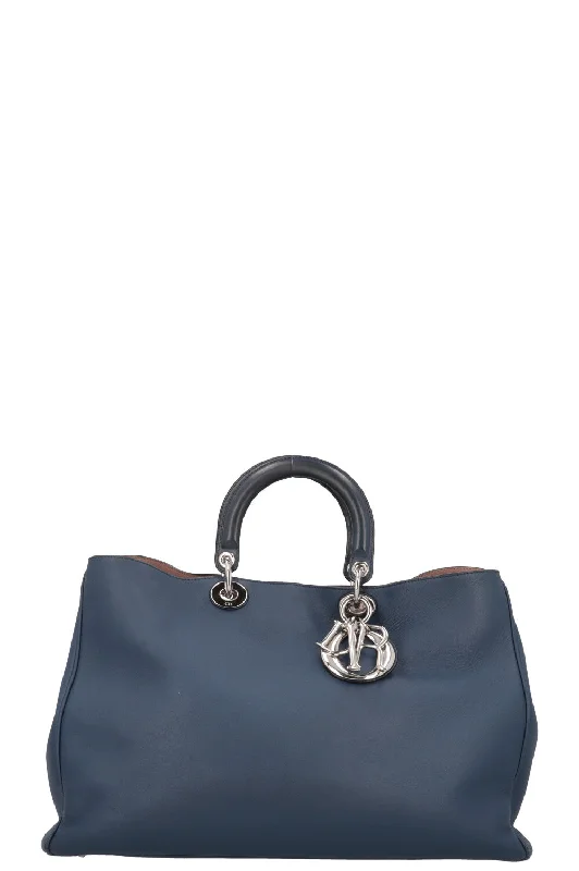 Christian Dior Saddle bags with a studded trim for a bold lookCHRISTIAN DIOR Diorissimo Bag Large Blue