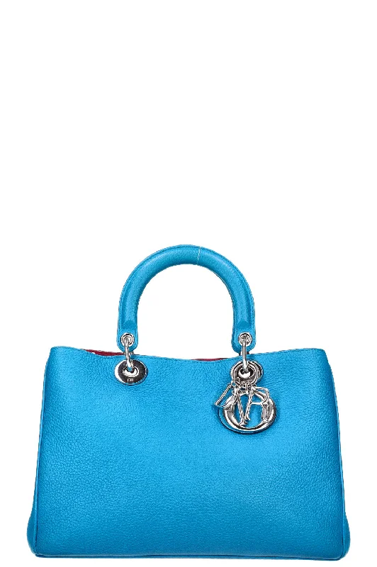 Christian Dior handbags with a snap - button closure and a decorative buckleCHRISTIAN DIOR Diorissimo Bag Medium Blue